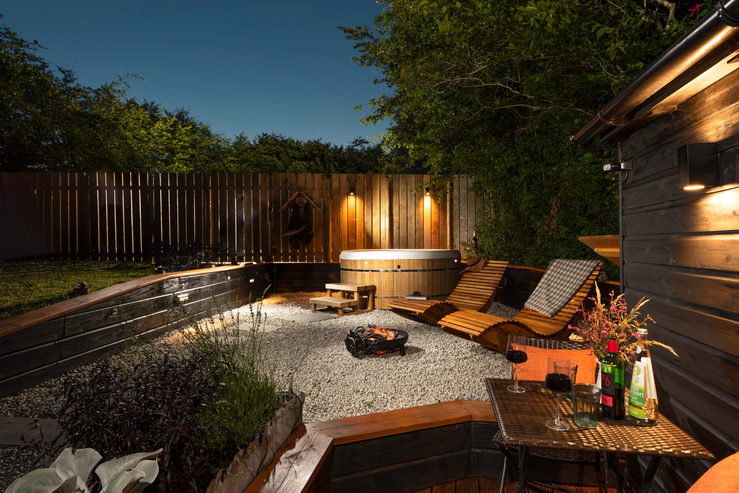 Straw Cottage hot tub area at night at Old Pound Smithy